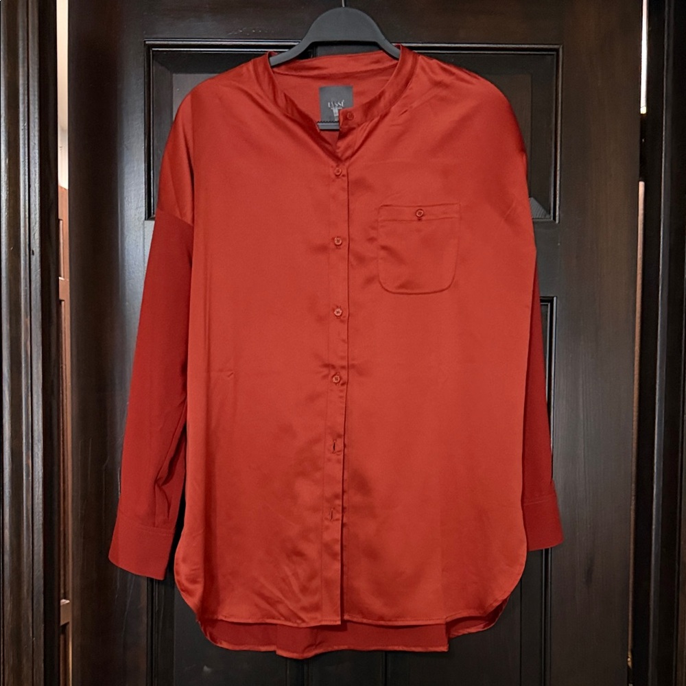 Lysse Rich burnt orange button down shirt.